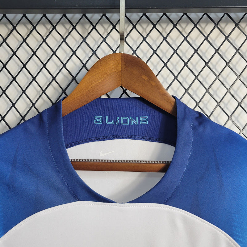 camisa-selecao-inglaterra-home-1-titular-2022-23-nike-torcedor-masculina-masculino-branca-branco-azul-bellingham-saka-hary-kane
