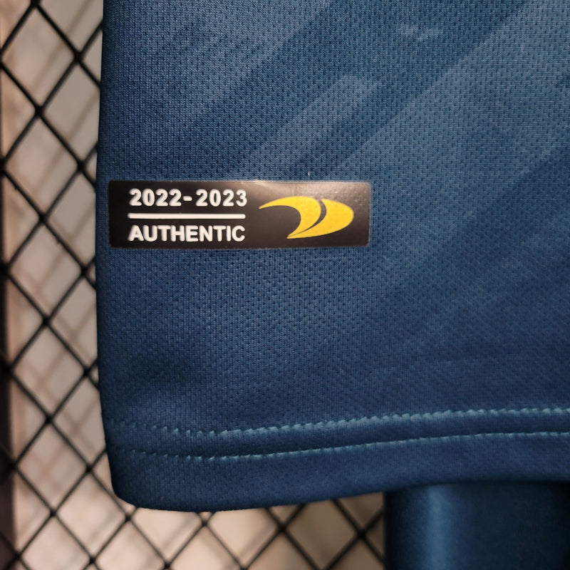 kit-conjunto-infantil-camisa-shorts-al-nassr-away-2-reserva-2022-23-duneus-torcedor-masculina-masculino-azul-amarelo-amarela-cr7-cristiano-ronaldo-alvaro-gonzalez-luiz-gustavo-arabia-shurfah
