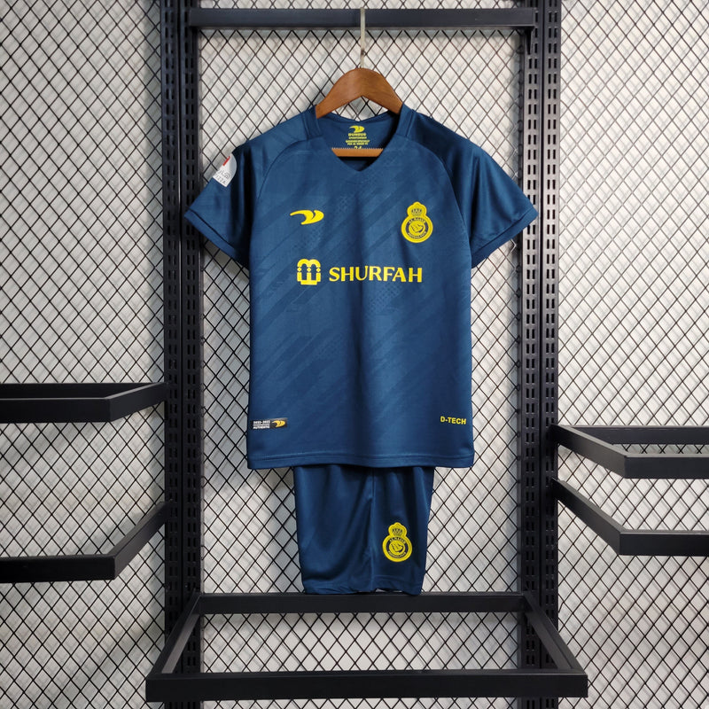 kit-conjunto-infantil-camisa-shorts-al-nassr-away-2-reserva-2022-23-duneus-torcedor-masculina-masculino-azul-amarelo-amarela-cr7-cristiano-ronaldo-alvaro-gonzalez-luiz-gustavo-arabia-shurfah

