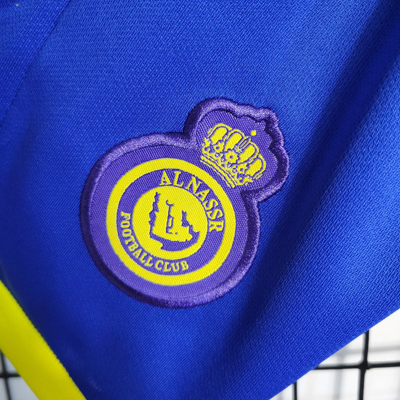 kit-conjunto-infantil-camisa-shorts-al-nassr-home-1-titular-2022-23-duneus-torcedor-masculina-masculino-azul-amarelo-amarela-cr7-cristiano-ronaldo-alvaro-gonzalez-luiz-gustavo-arabia-shurfah
