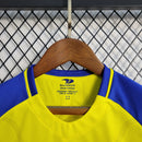 kit-conjunto-infantil-camisa-shorts-al-nassr-home-1-titular-2022-23-duneus-torcedor-masculina-masculino-azul-amarelo-amarela-cr7-cristiano-ronaldo-alvaro-gonzalez-luiz-gustavo-arabia-shurfah
