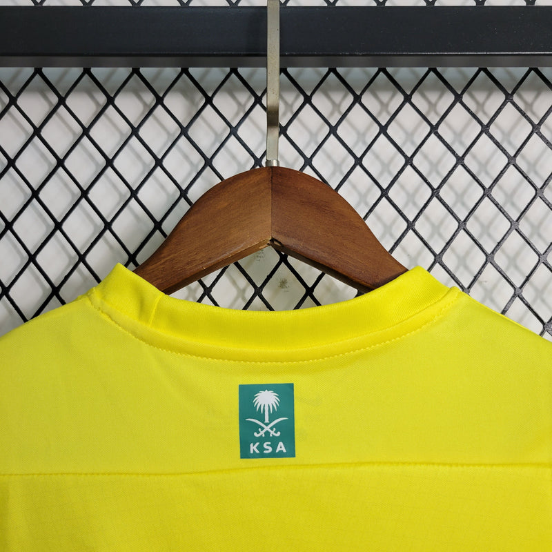 kit-conjunto-infantil-camisa-shorts-al-nassr-home-1-titular-2023-24-nike-torcedor-masculina-masculino-azul-amarelo-amarela-cr7-cristiano-ronaldo-talisca-mane-kafd-aroya-arabia-saudita
