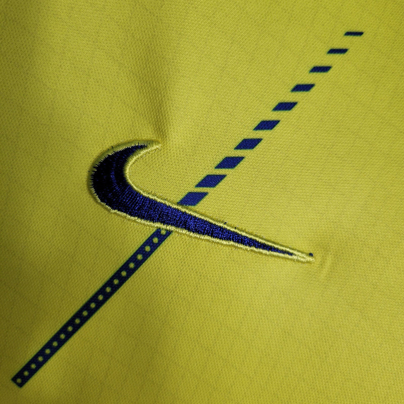 kit-conjunto-infantil-camisa-shorts-al-nassr-home-1-titular-2023-24-nike-torcedor-masculina-masculino-azul-amarelo-amarela-cr7-cristiano-ronaldo-talisca-mane-kafd-aroya-arabia-saudita
