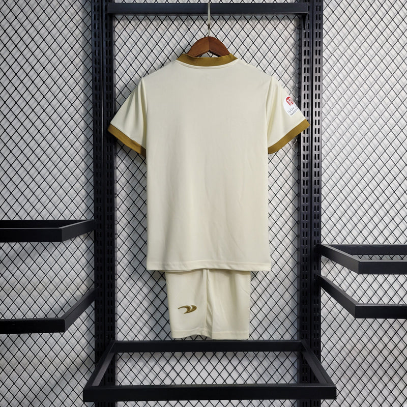 kit-conjunto-infantil-camisa-shorts-al-nassr-third-3-terceira-2022-23-duneus-torcedor-masculina-masculino-bege-caramelo-cr7-cristiano-ronaldo-alvaro-gonzalez-luiz-gustavo-arabia-saudita-shurfah
